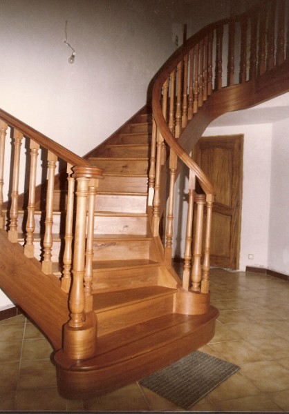 Elm stair built with horizontal laminates and solid wood rail