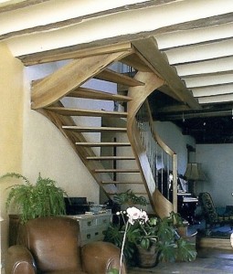 Elm stair in horizontal laminates with rail cut from the stringer