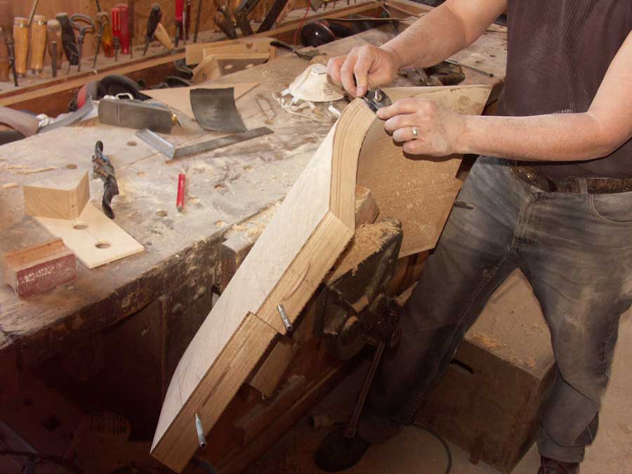 Hand smoothing a laminated stringer