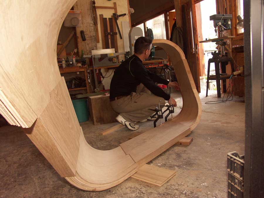 Marking out the final shape of a curved stringer in the workshop